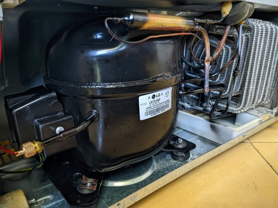 LG refrigerator compressor with service connections