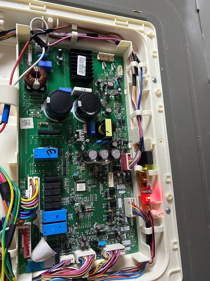 Refrigerator control board opened for testing during a diagnosis